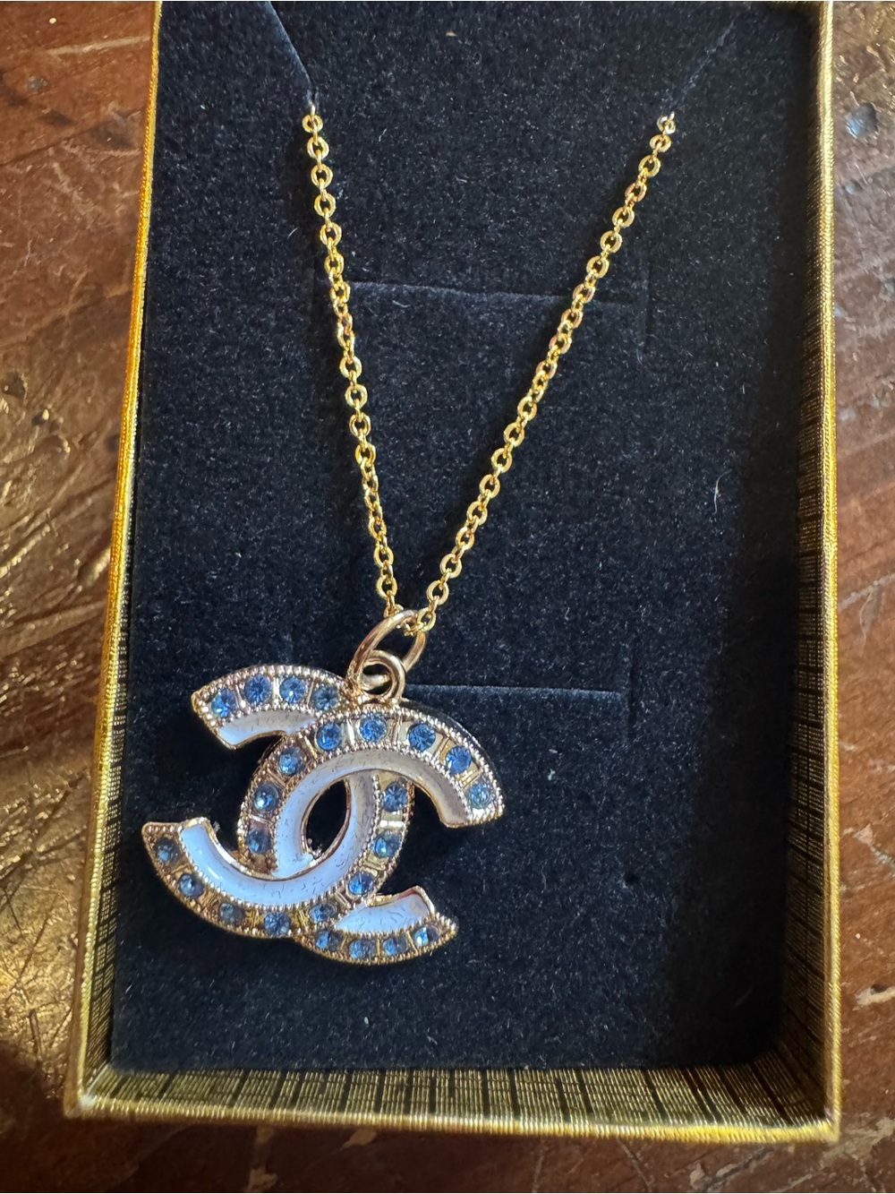 CHANEL Pull Gold-Tone Necklace with Blue Crystal Double C Pendant